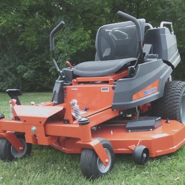 Orange zero-turn riding mower
