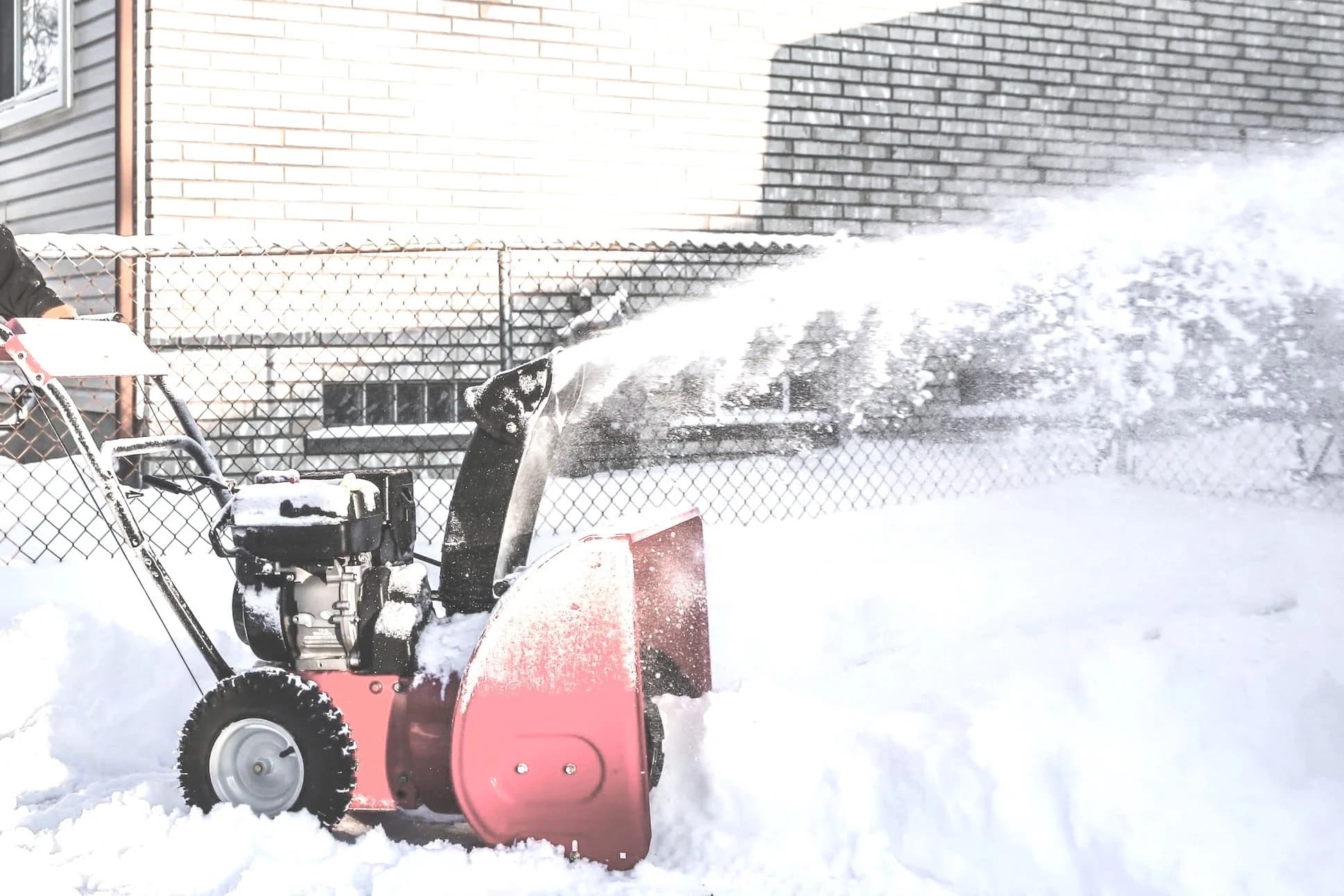 Snowblower clearing snow
